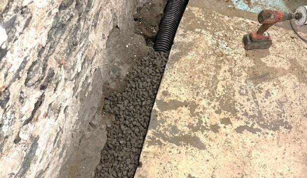 Mise en place de pierre pour drainage